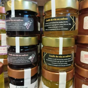 Pots de confit de vin au safran (rouge et blanc AOC Bordeaux bio). Ingrédients: vin, sucre canne bio, agar-agar bio, safran. Accompagne foie gras, fromages. 100g.